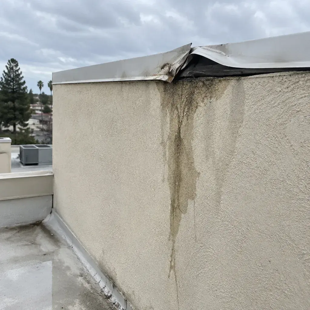 Roof-to-Wall Flashing Repair roof leak repair in the United States